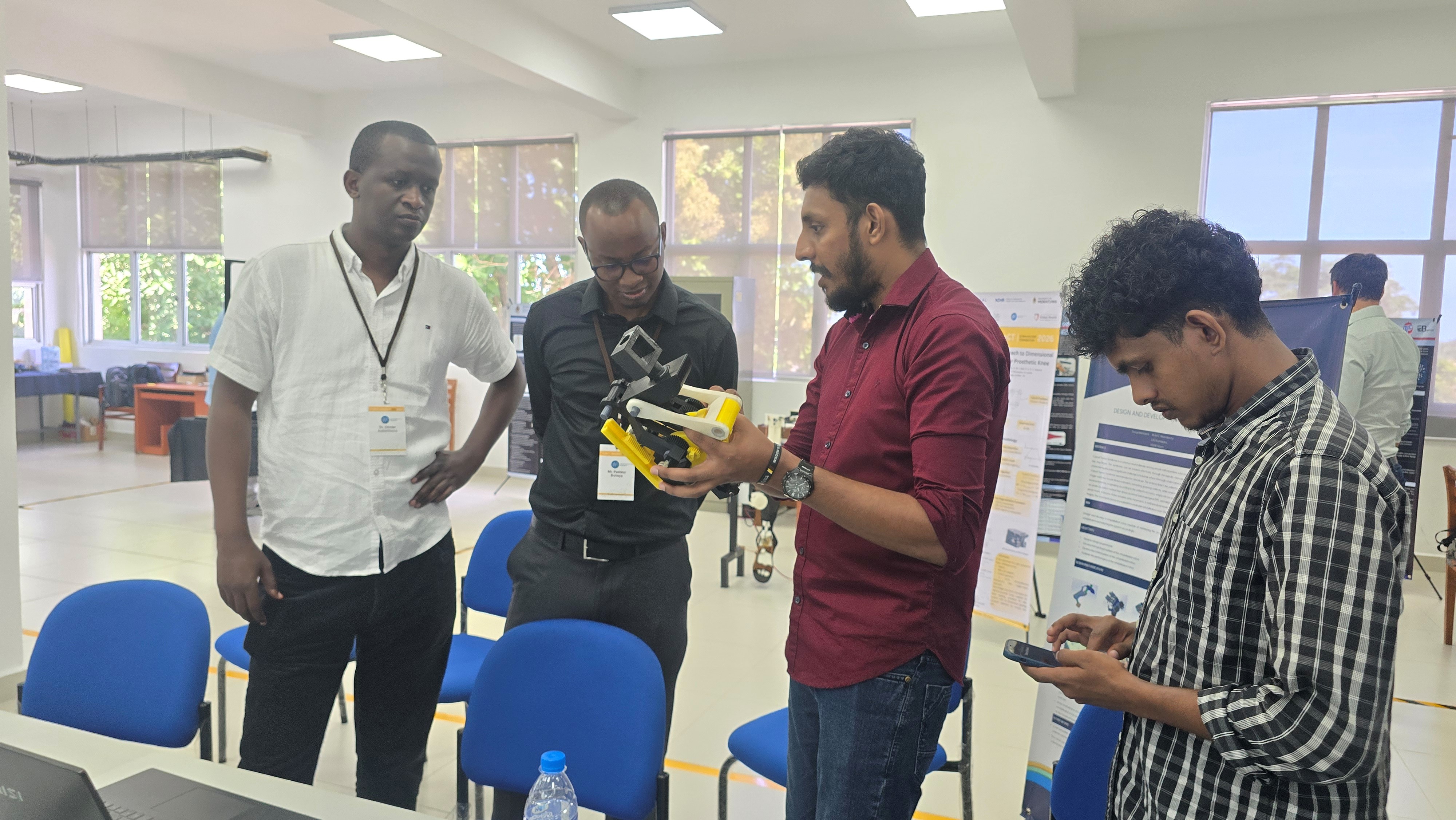 Demonstration of a prosthetic knee prototype to visiting researchers